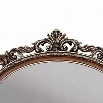Specchiera ovale con accenti, cornice in ciliegio e scrollwork in champagne spazzolato, 43x53